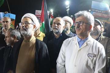 گزارش تصویری تجمع اعتراضی سپید پوشان مدافع سلامت گیلان در پی بمباران وحشیانه بیمارستانی در غزه